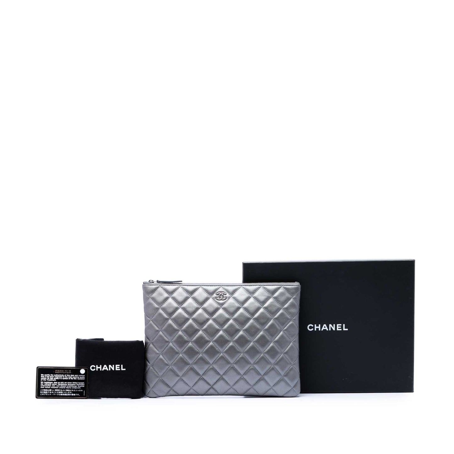 Chanel Medium Quilted Metallic Lambskin O Case Clutch