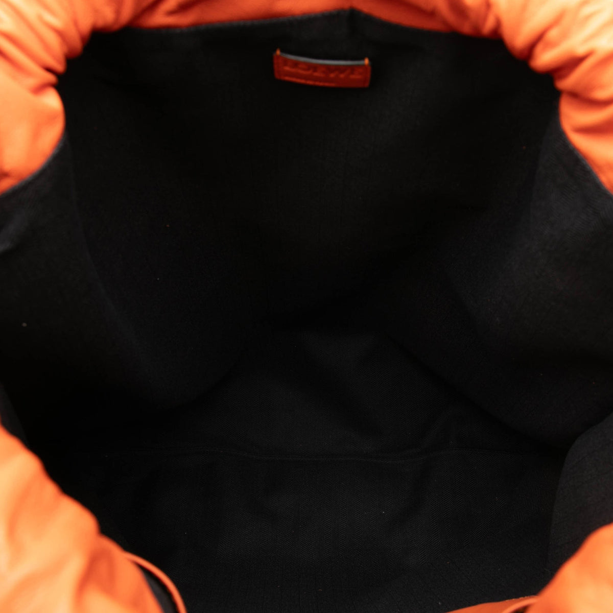 LOEWE Embossed Anagram Leather Yago Knot Backpack — Orange