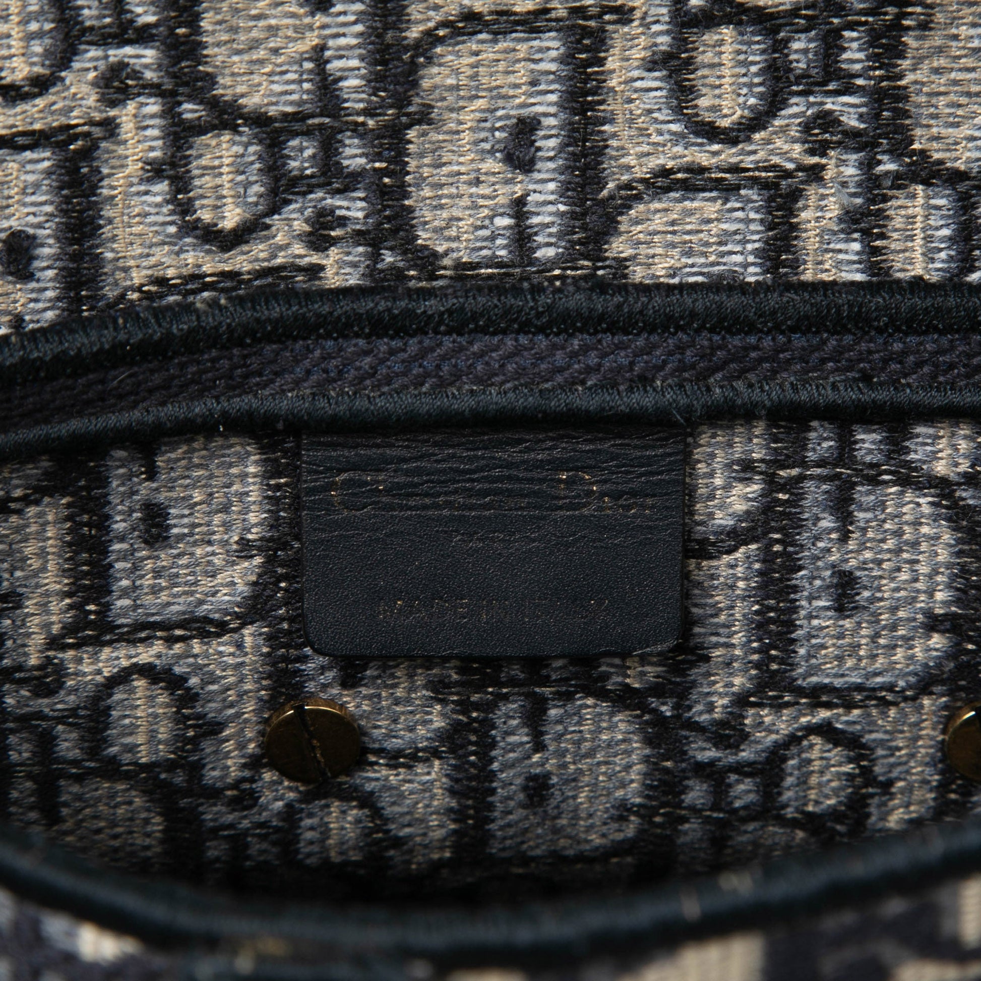 Oblique Embroidered Canvas Saddle Bag