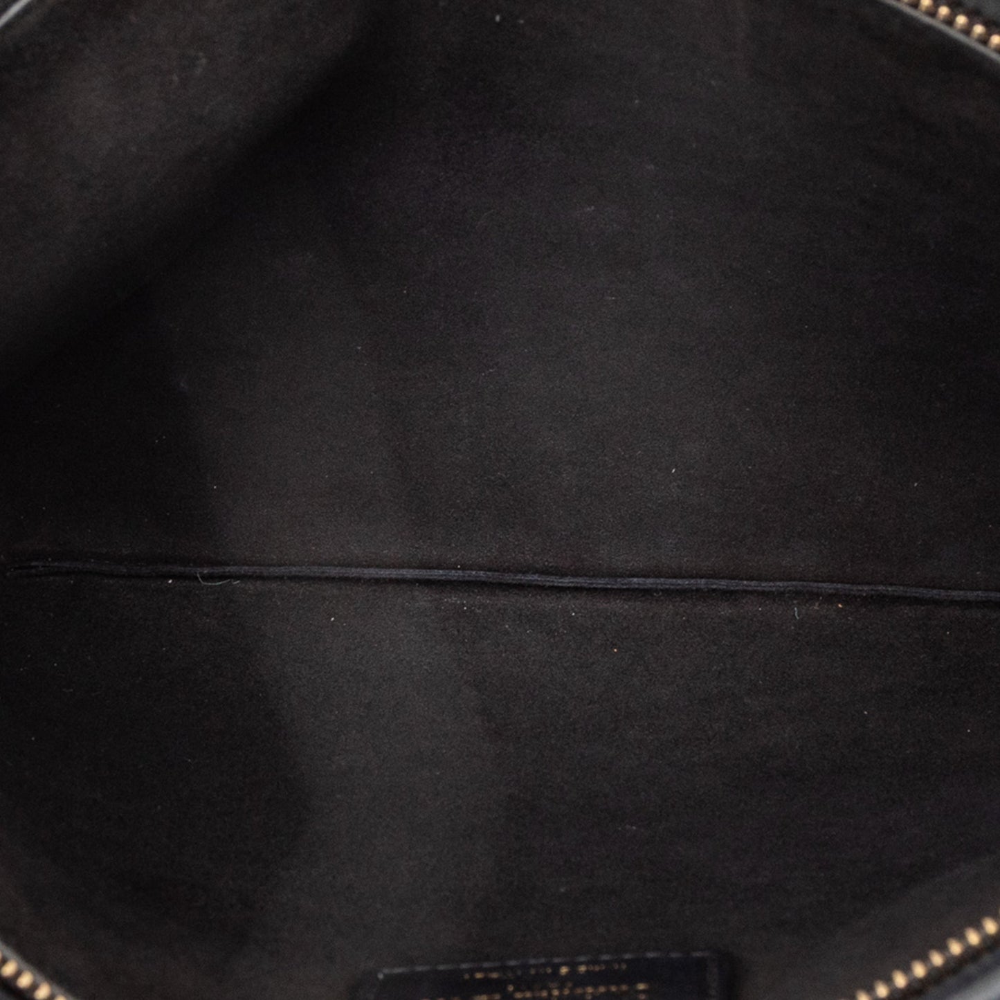 Dior Logo Embossed Leather Clutch