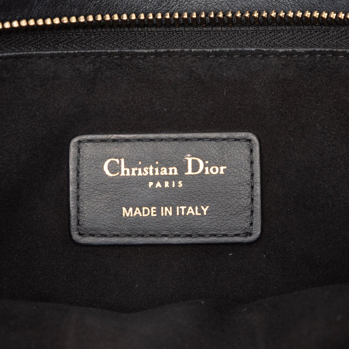 Dior Logo Embossed Leather Clutch