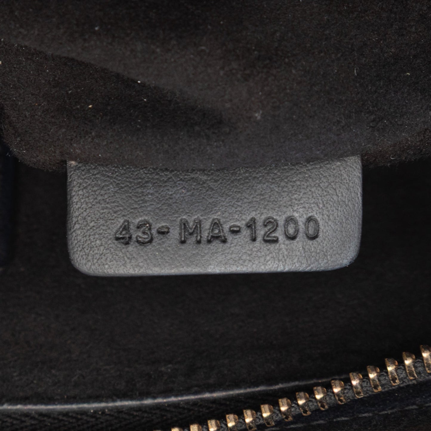 Dior Logo Embossed Leather Clutch