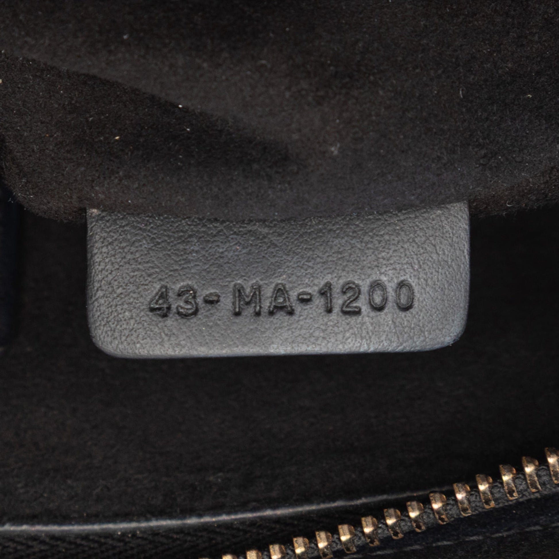 Dior Logo Embossed Leather Clutch