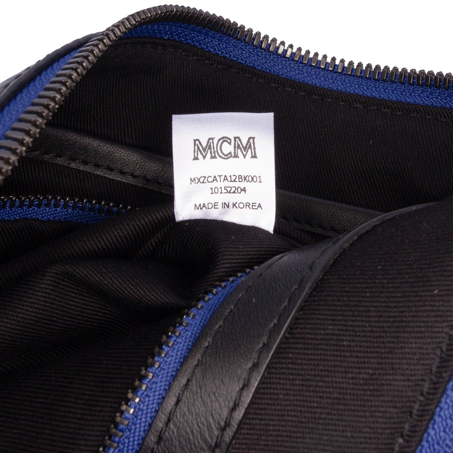 MCM Sambypen Haru Henry Kaiser Visetos Coated Canvas Clutch