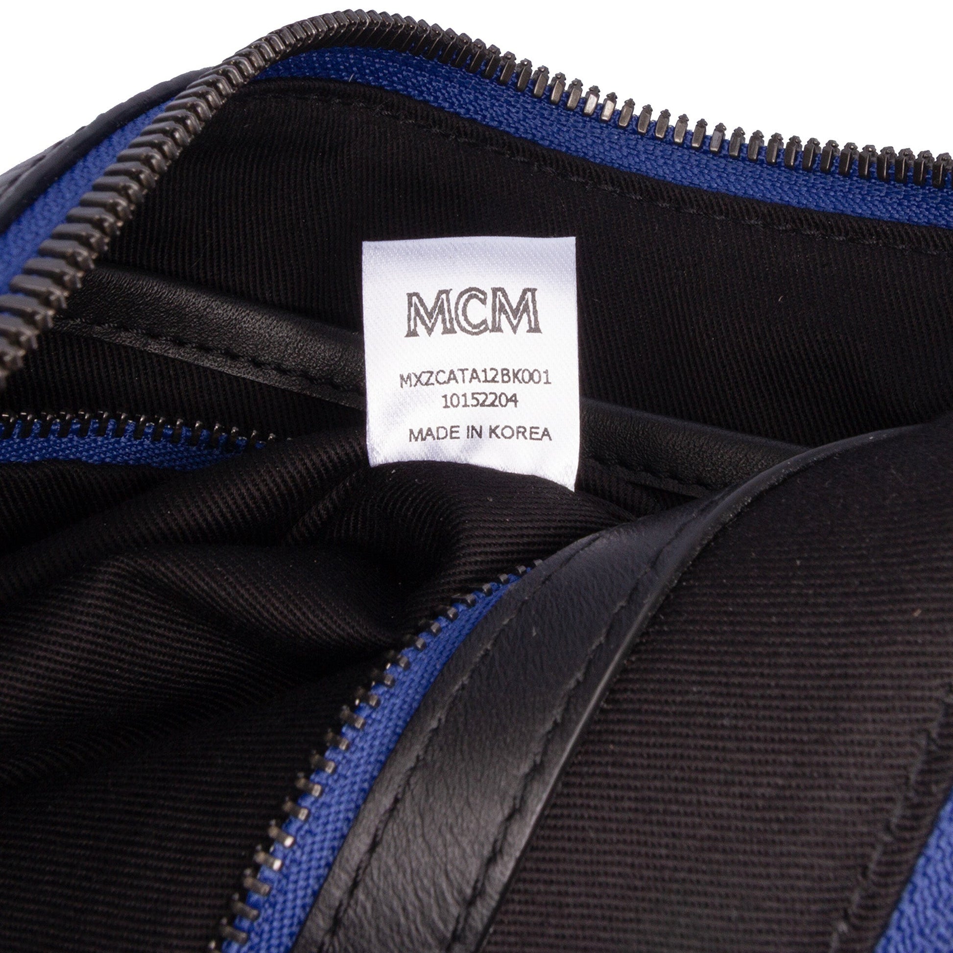 MCM Sambypen Haru Henry Kaiser Visetos Coated Canvas Clutch