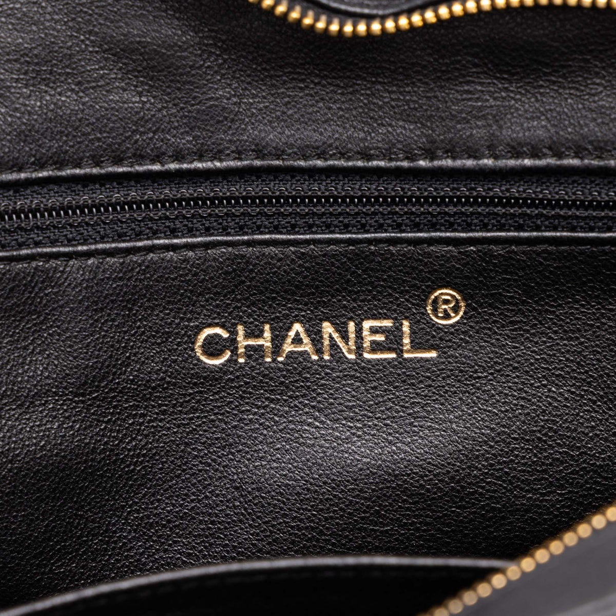 Chanel CC Stitched Lambskin Handbag — Black