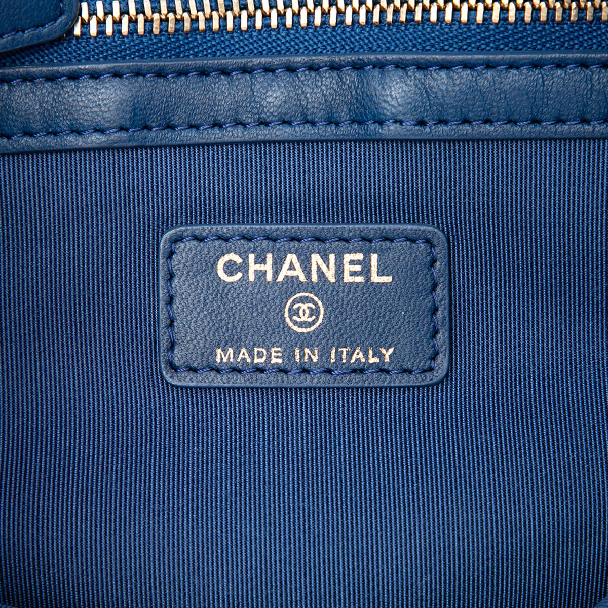 Chanel Medium Quilted Lambskin O Case Clutch — Blue