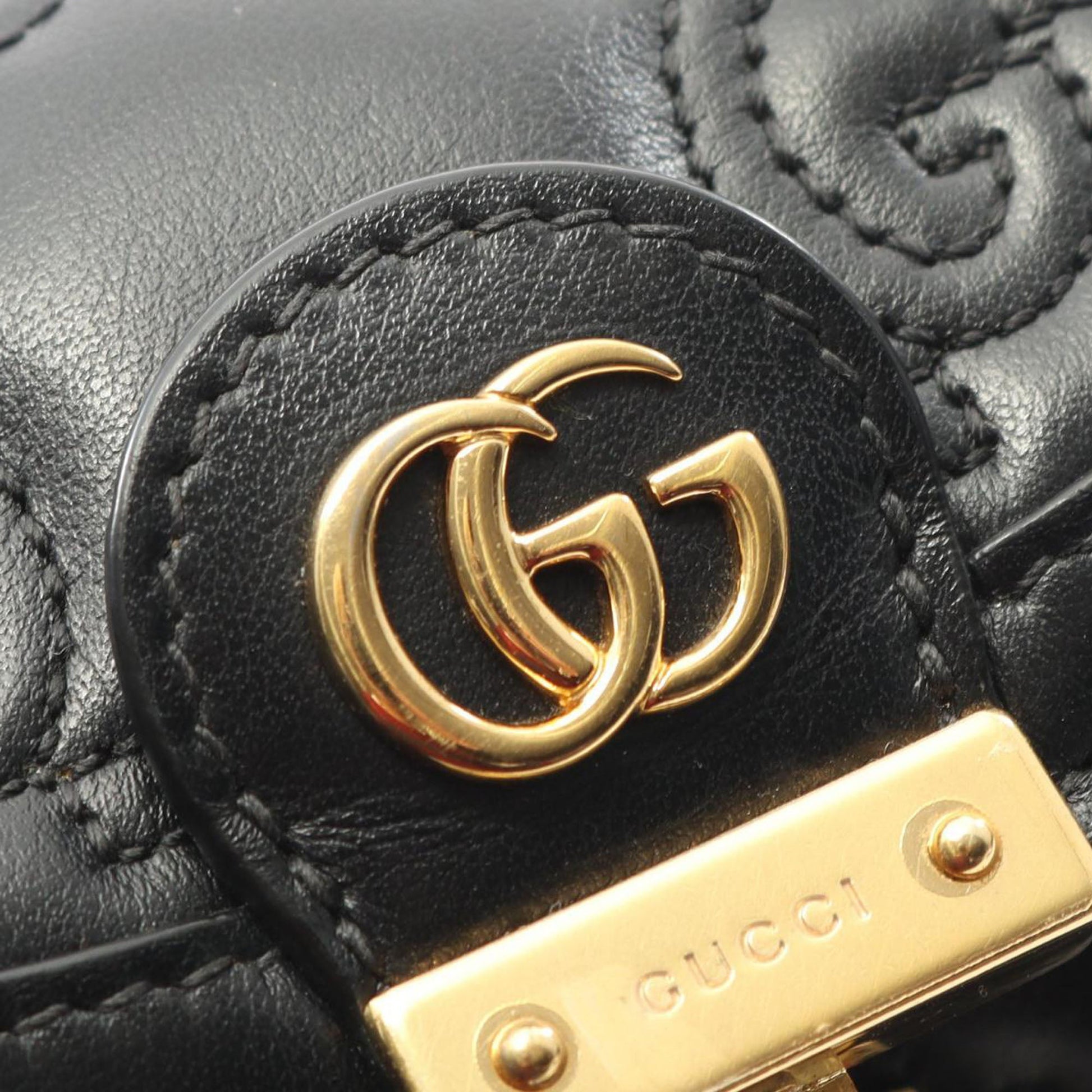 Gucci Small GG Matelasse Leather Top Handle Bag