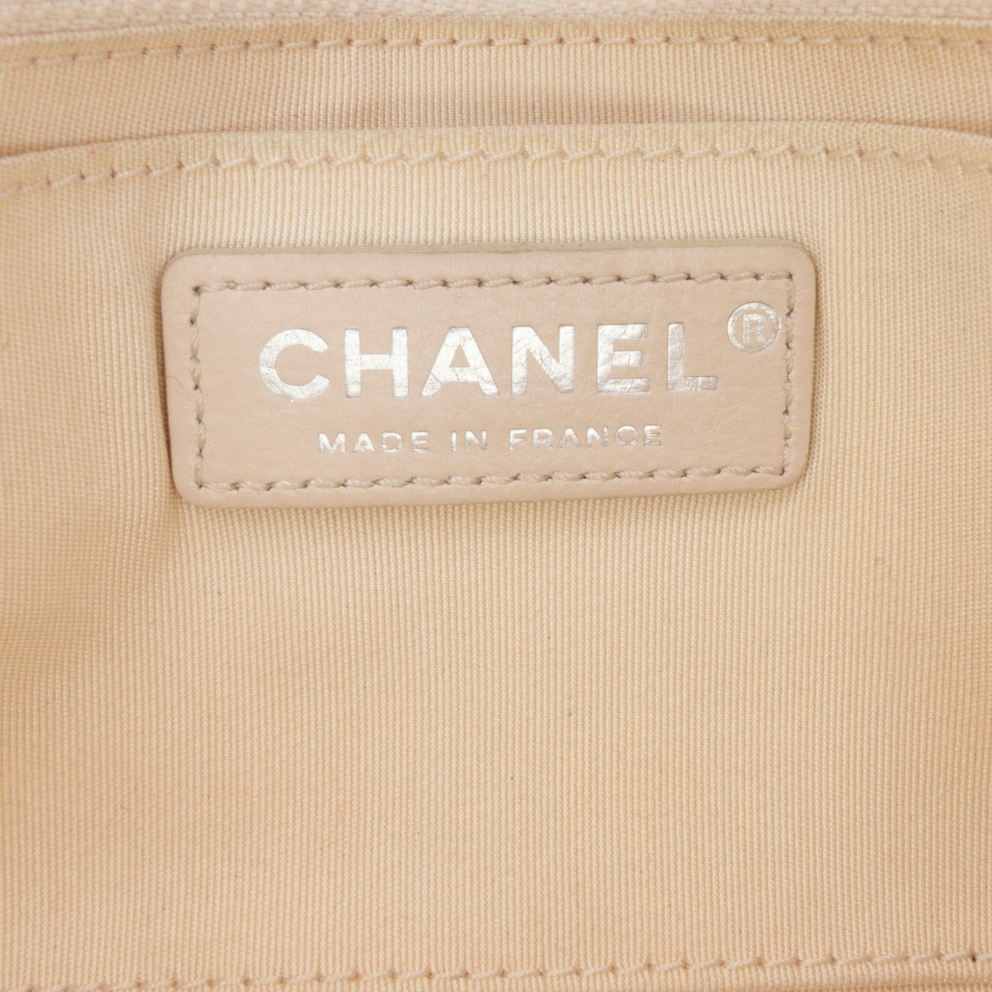 Chanel Quilted Calfskin Chain Embossed Flap