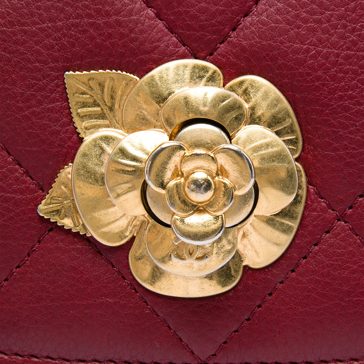 Chanel Quilted Calfskin Camellia Turn Lock Flap