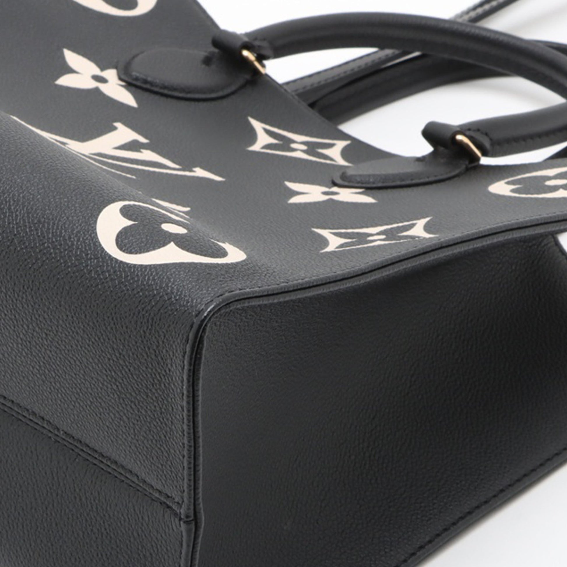 Louis Vuitton Bicolor Monogram Empreinte Giant Onthego MM