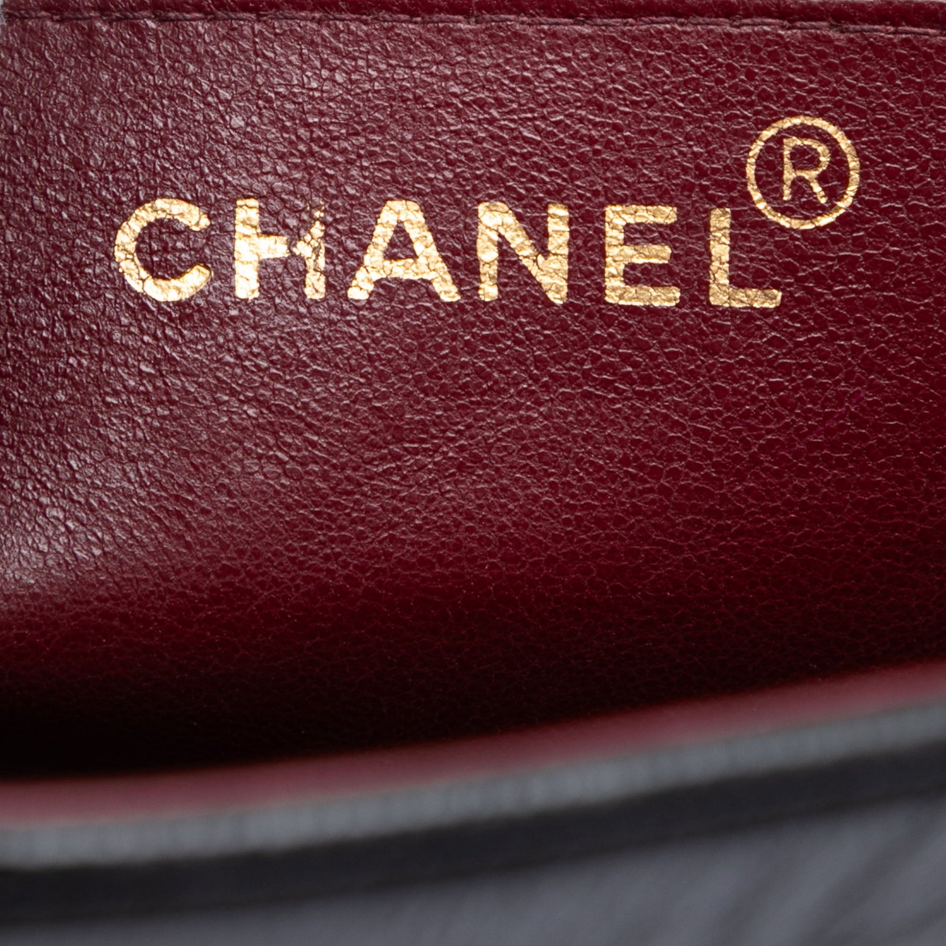 Chanel CC Vertical Quilt Lambskin Flap