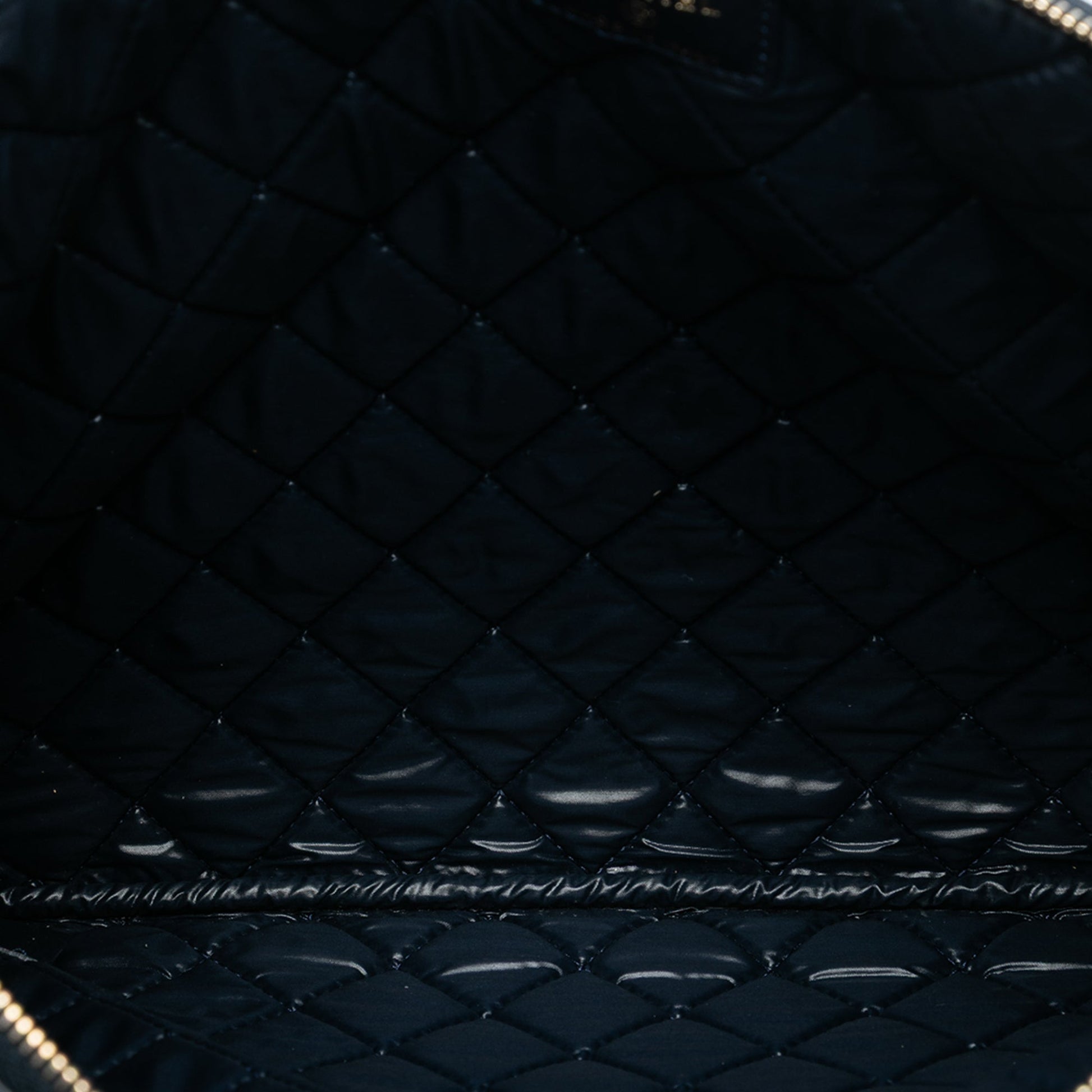 Chanel Large Quilted Lambskin O Case Clutch