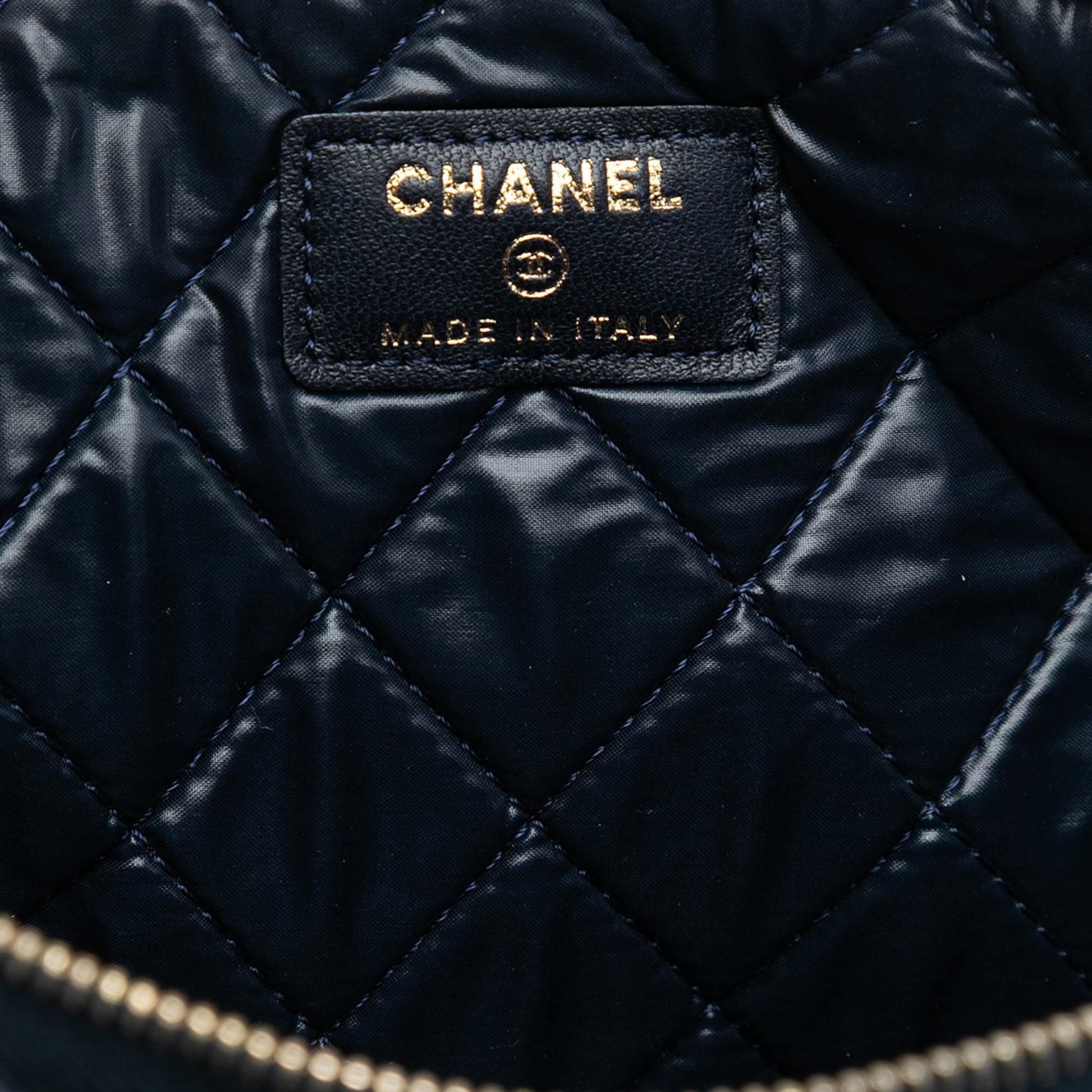Chanel Large Quilted Lambskin O Case Clutch