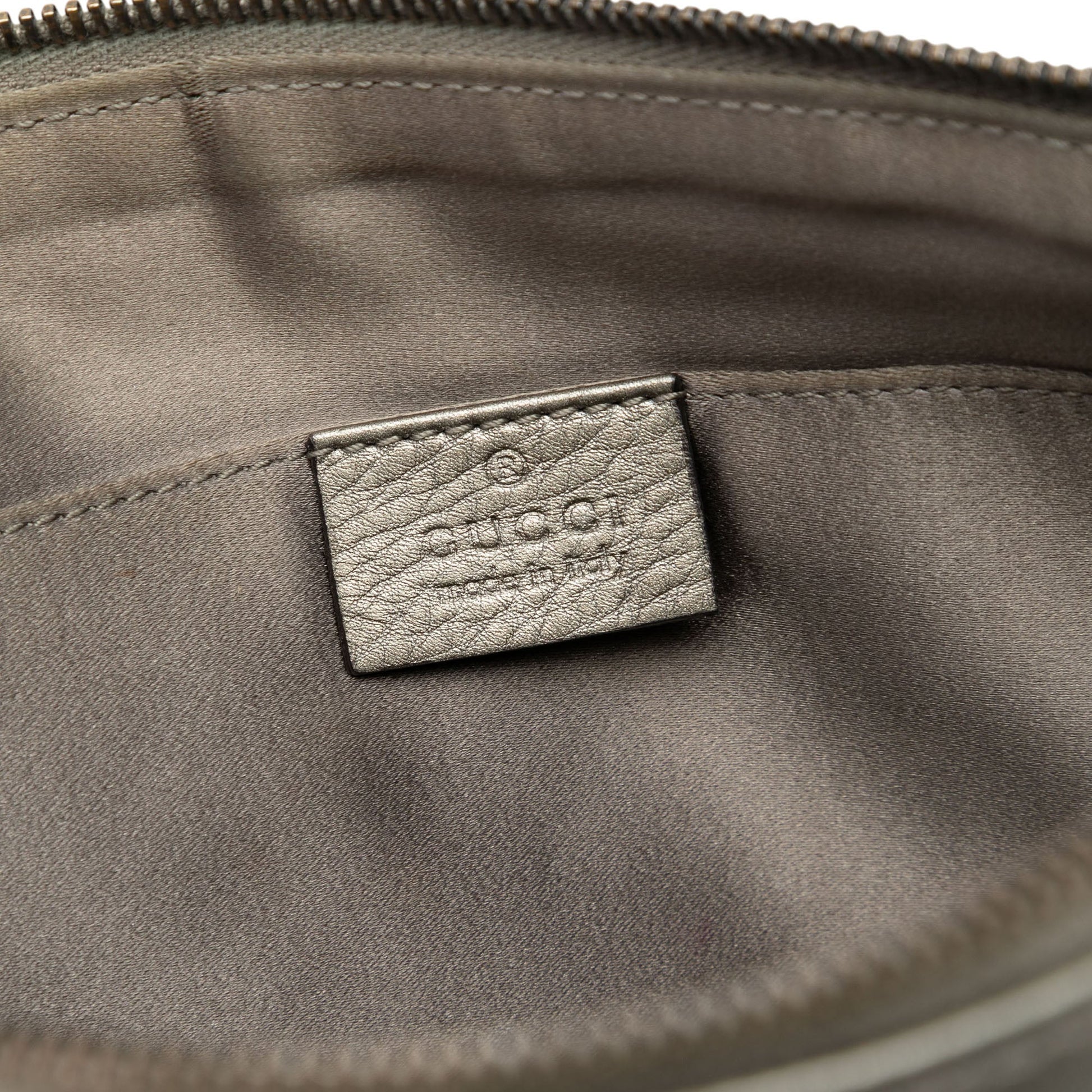 Gucci Metallic Leather Sienna Tassel Clutch