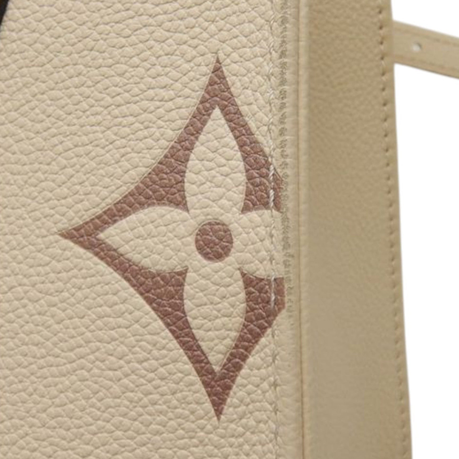 Louis Vuitton Bicolor Monogram Empreinte Giant Onthego PM
