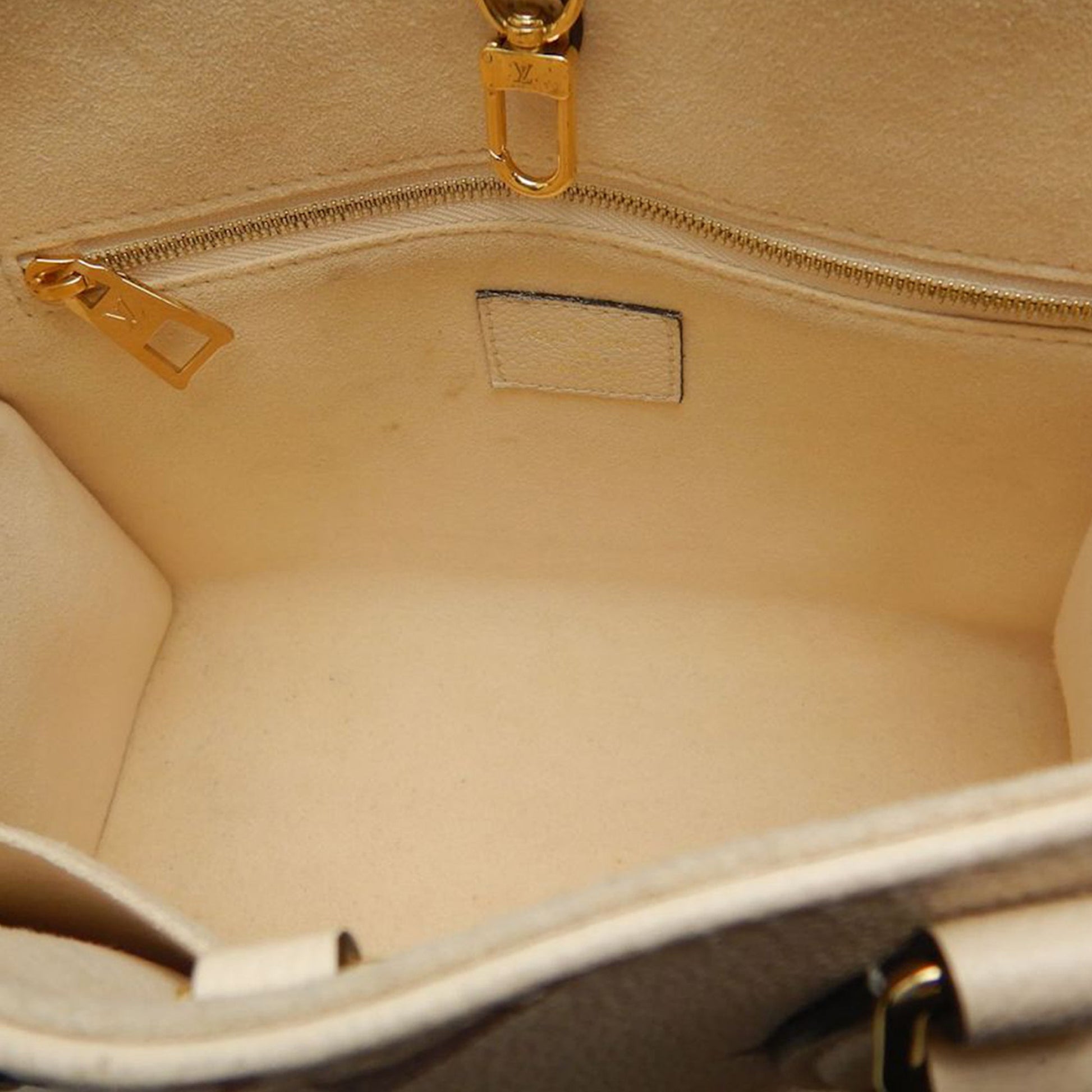 Louis Vuitton Bicolor Monogram Empreinte Giant Onthego PM
