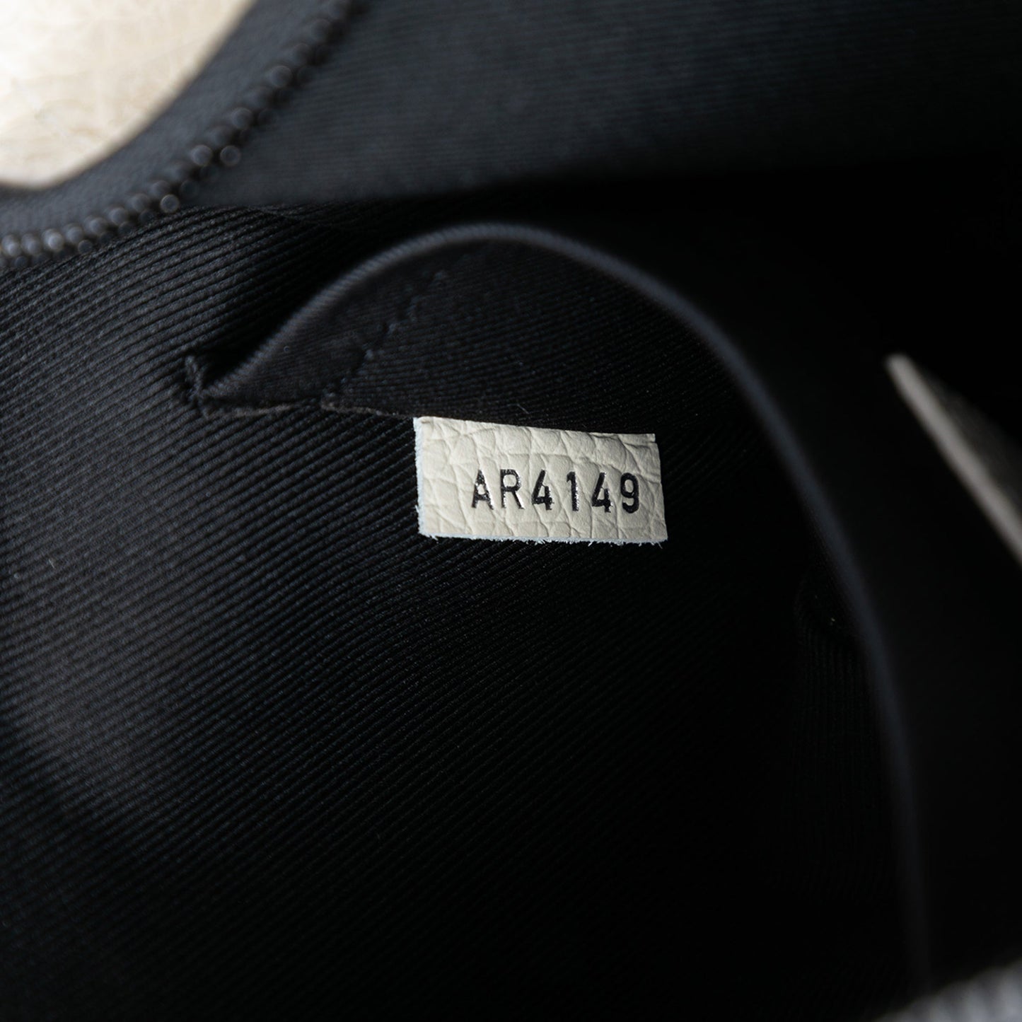 Monogram Empreinte Triangle Messenger Bag