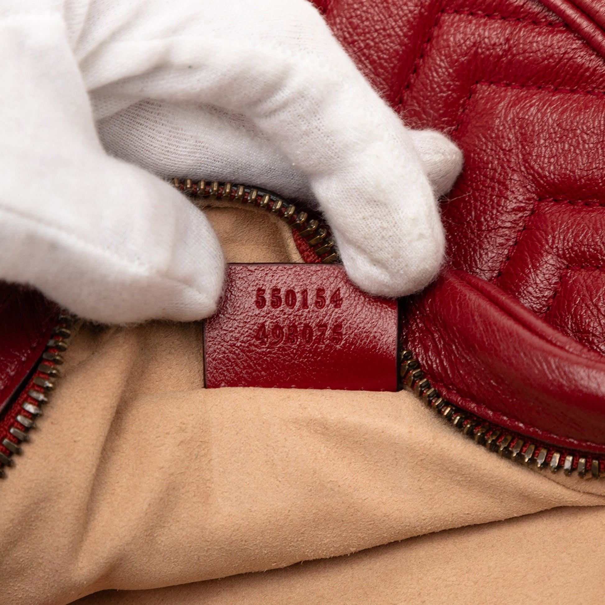 Gucci Mini GG Marmont Matelasse Leather Round Crossbody