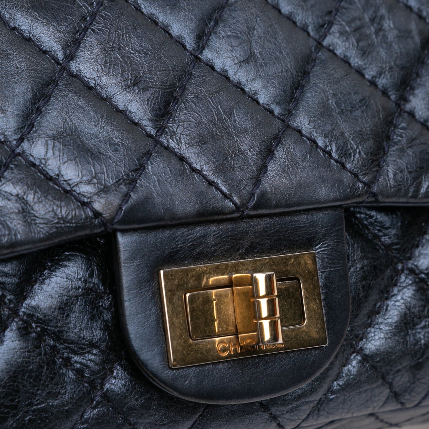 Chanel Quilted Glazed Calfskin Reissue 2.55 East West Single Flap