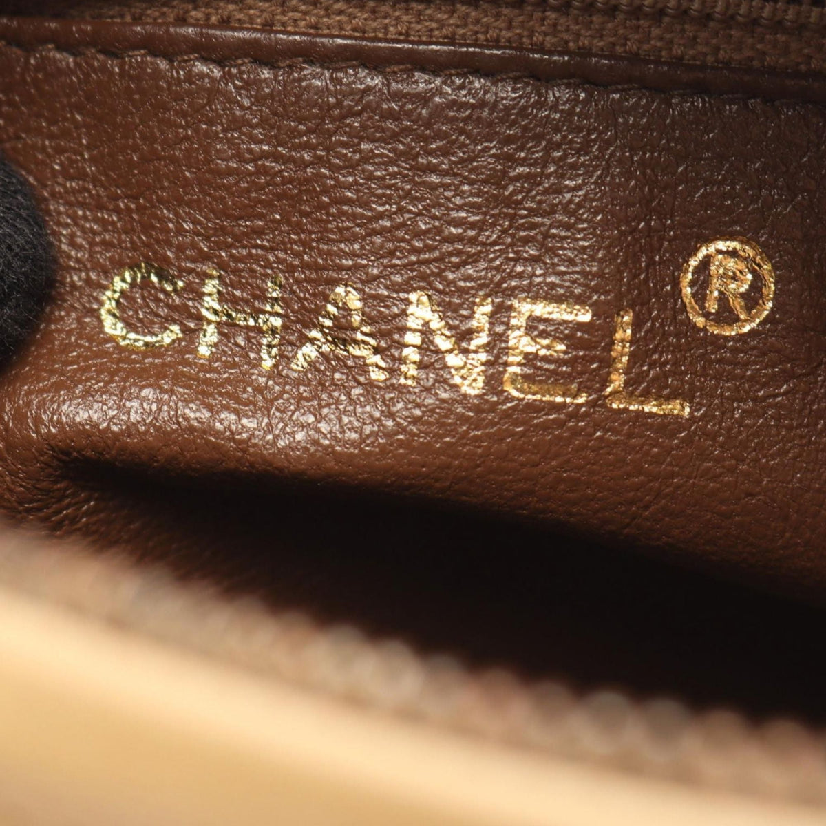 Chanel CC Quilted Lambskin Tassel Camera Bag — Beige