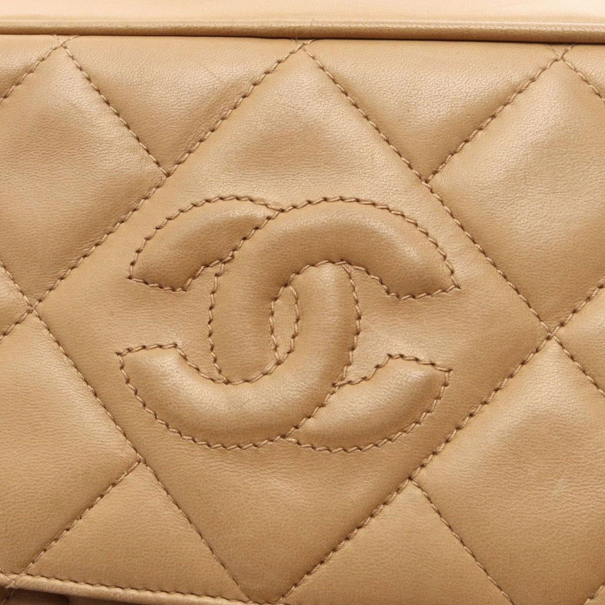 Chanel CC Quilted Lambskin Tassel Camera Bag — Beige