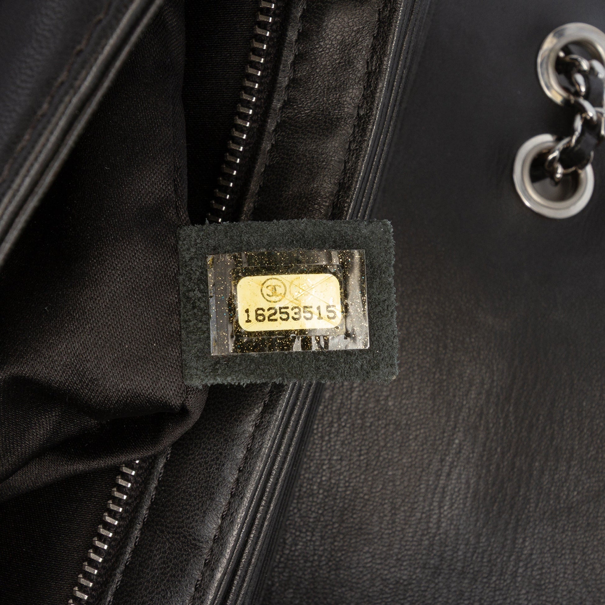 Chanel Medium Quilted Lambskin Clams Pocket Flap