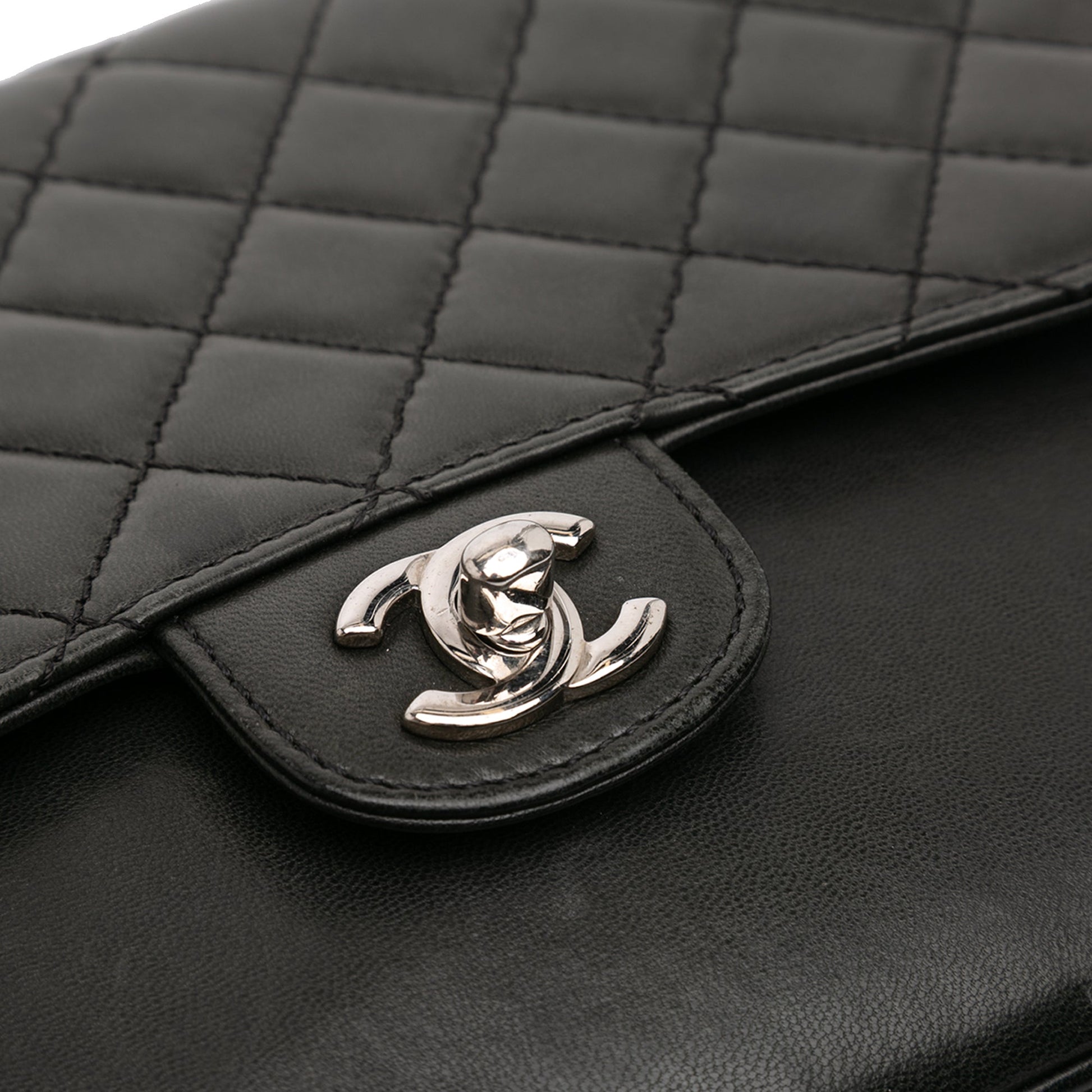 Chanel Medium Quilted Lambskin Clams Pocket Flap