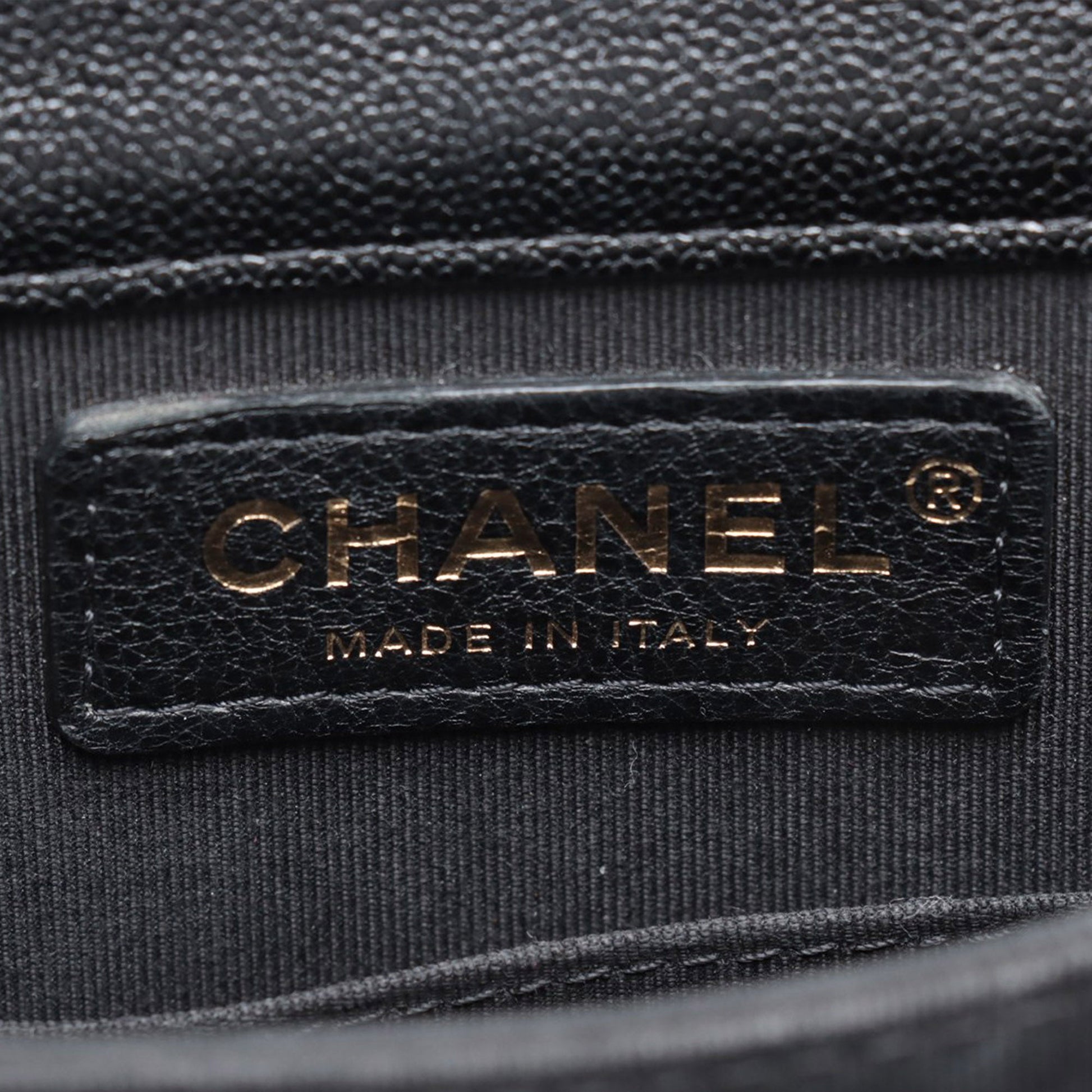 Chanel Quilted Caviar North South Boy Flap