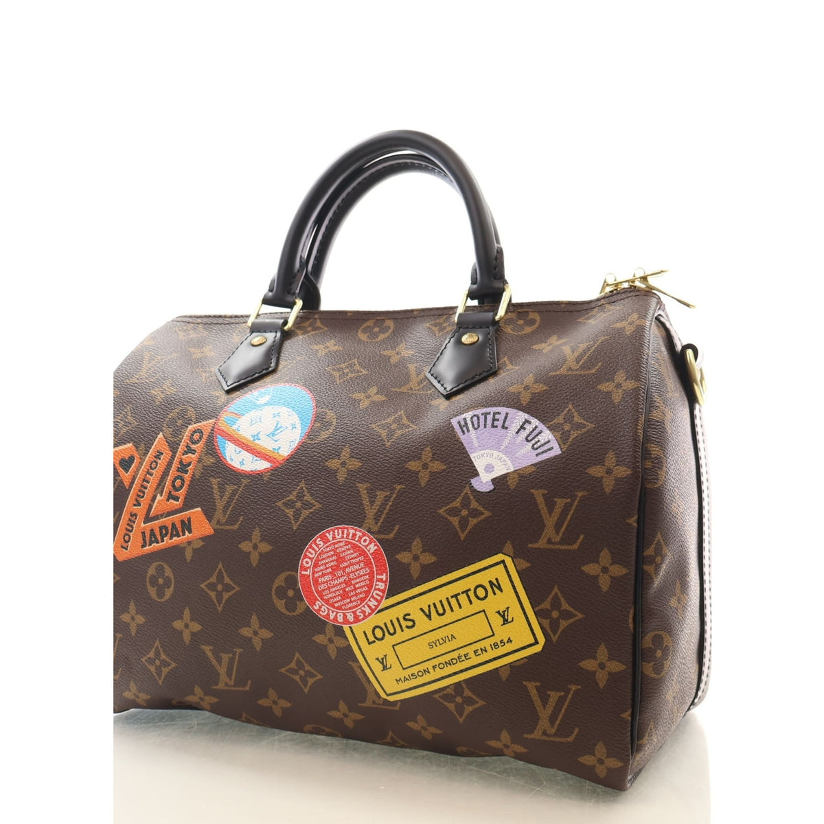 Louis Vuitton Monogram World Tour Speedy Bandouliere 30 — Brown