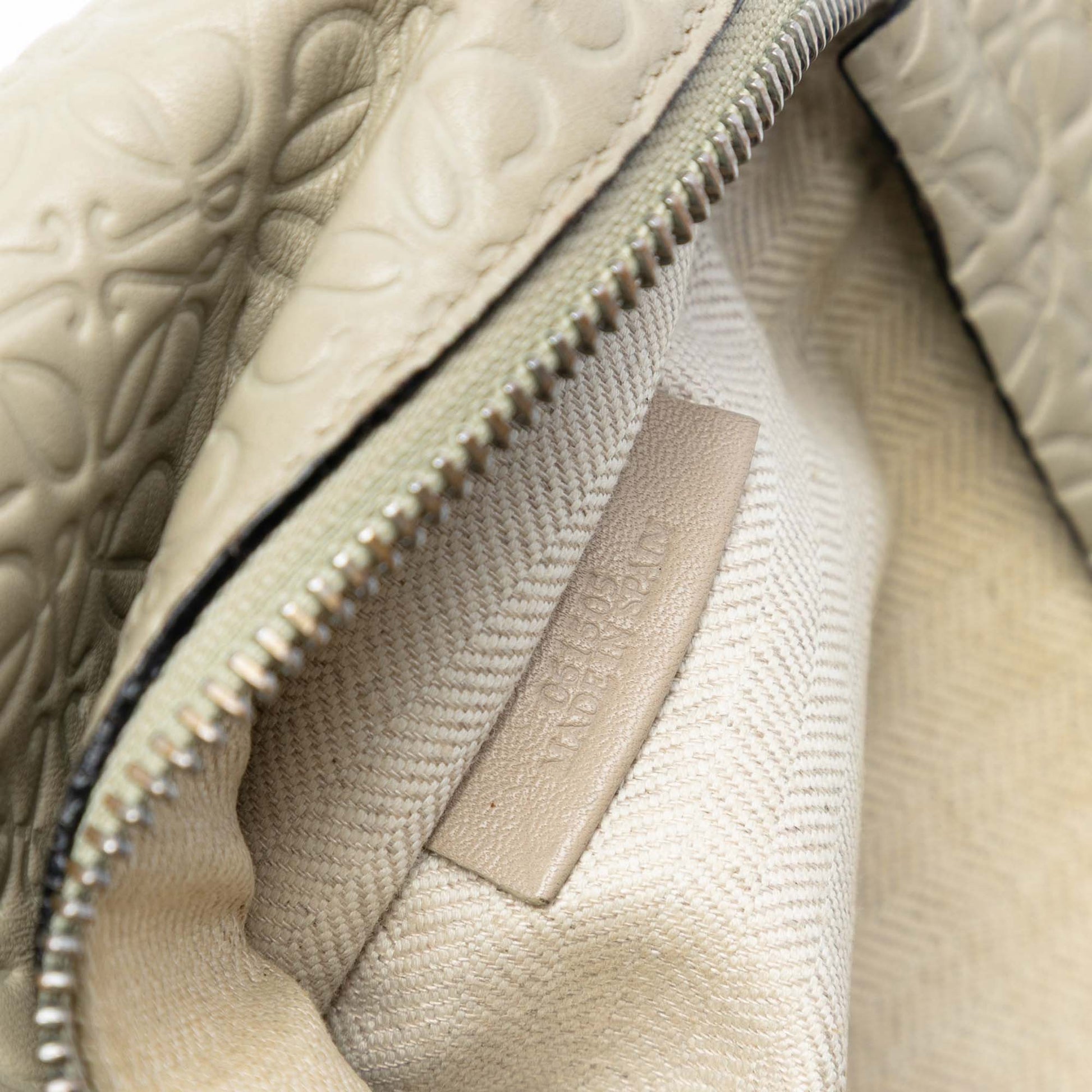 LOEWE Embossed Leather Anagram Repeat T Clutch