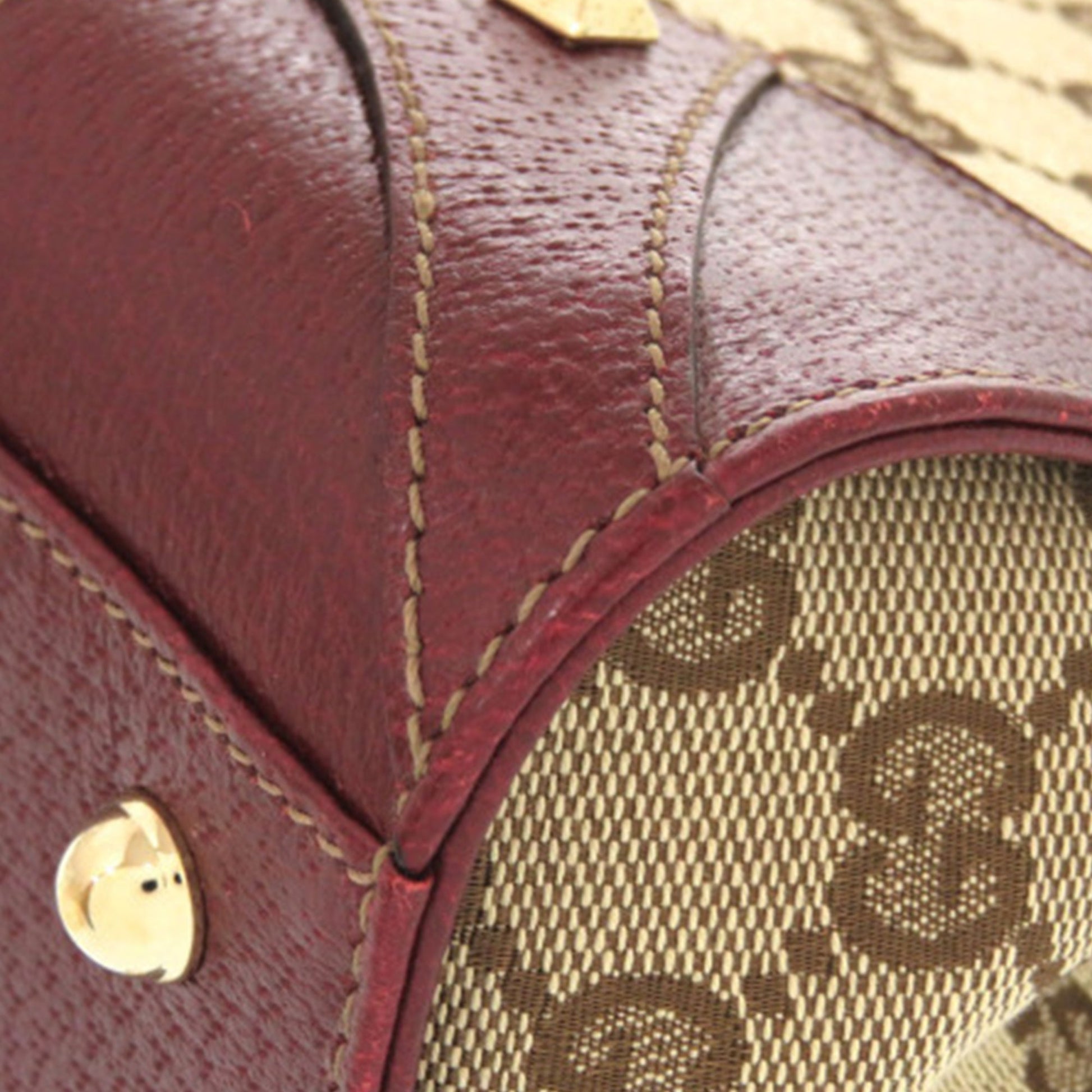 GG Canvas Nailhead Handbag