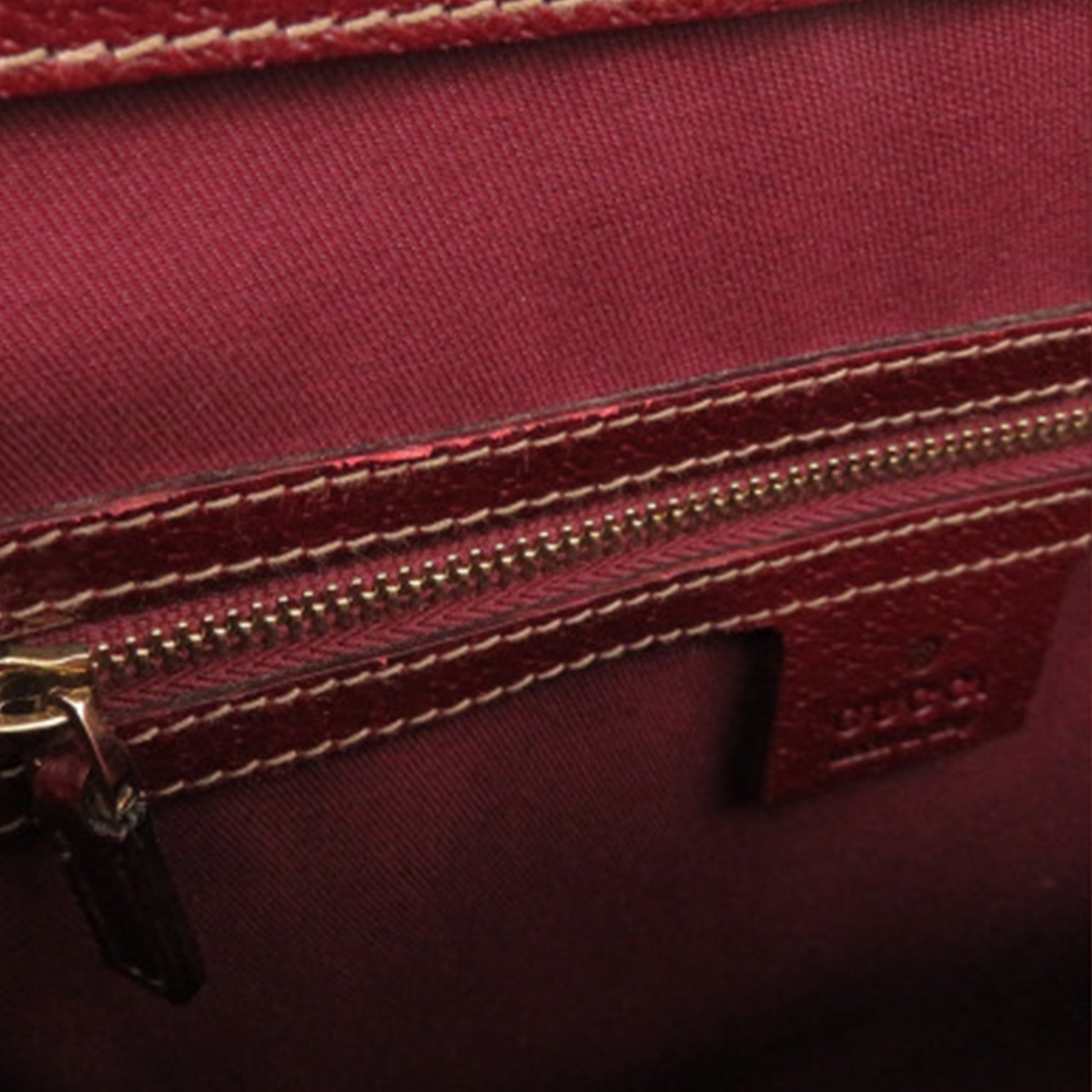 GG Canvas Nailhead Handbag