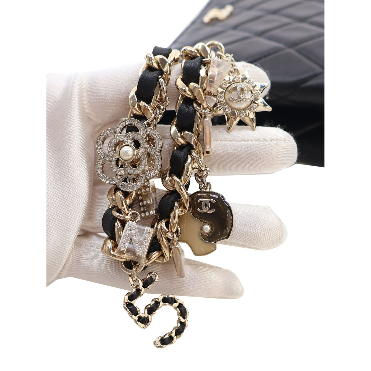 Chanel CC Quilted Lambskin Coco Charms Chain Wristlet Pouch — Black