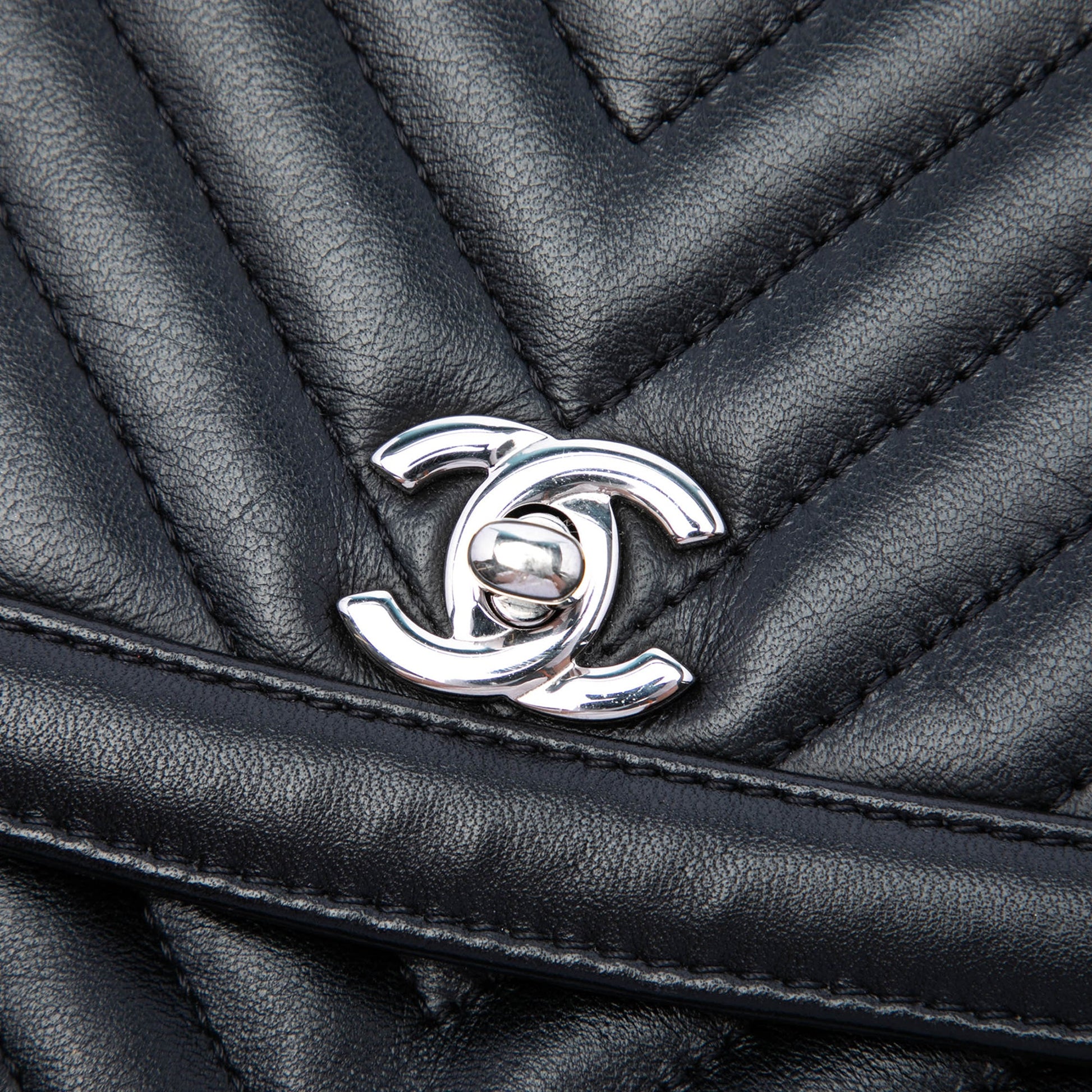 Chanel CC Chevron Lambskin Round Flap Clutch