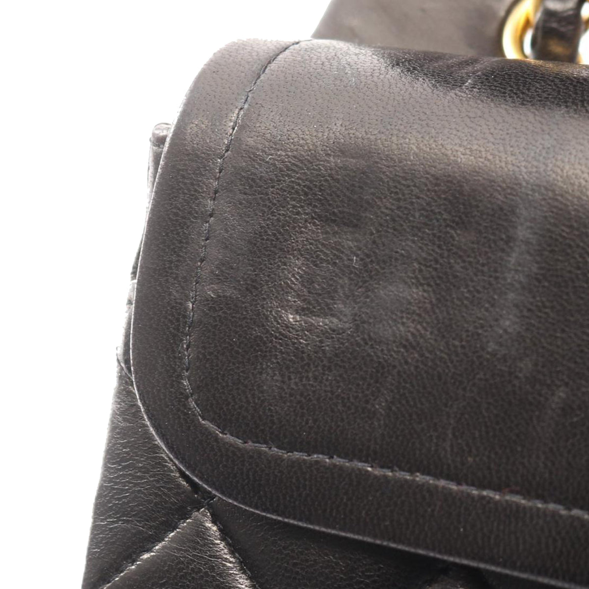 Chanel Small Classic Lambskin Double Flap — Black