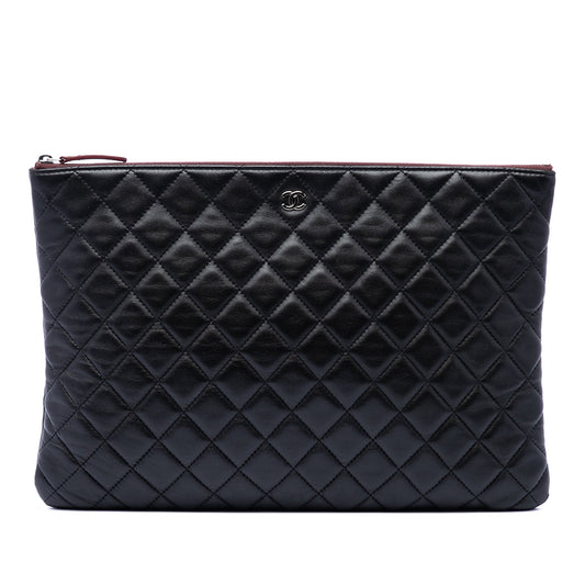 Chanel Large Quilted Lambskin O Case Clutch