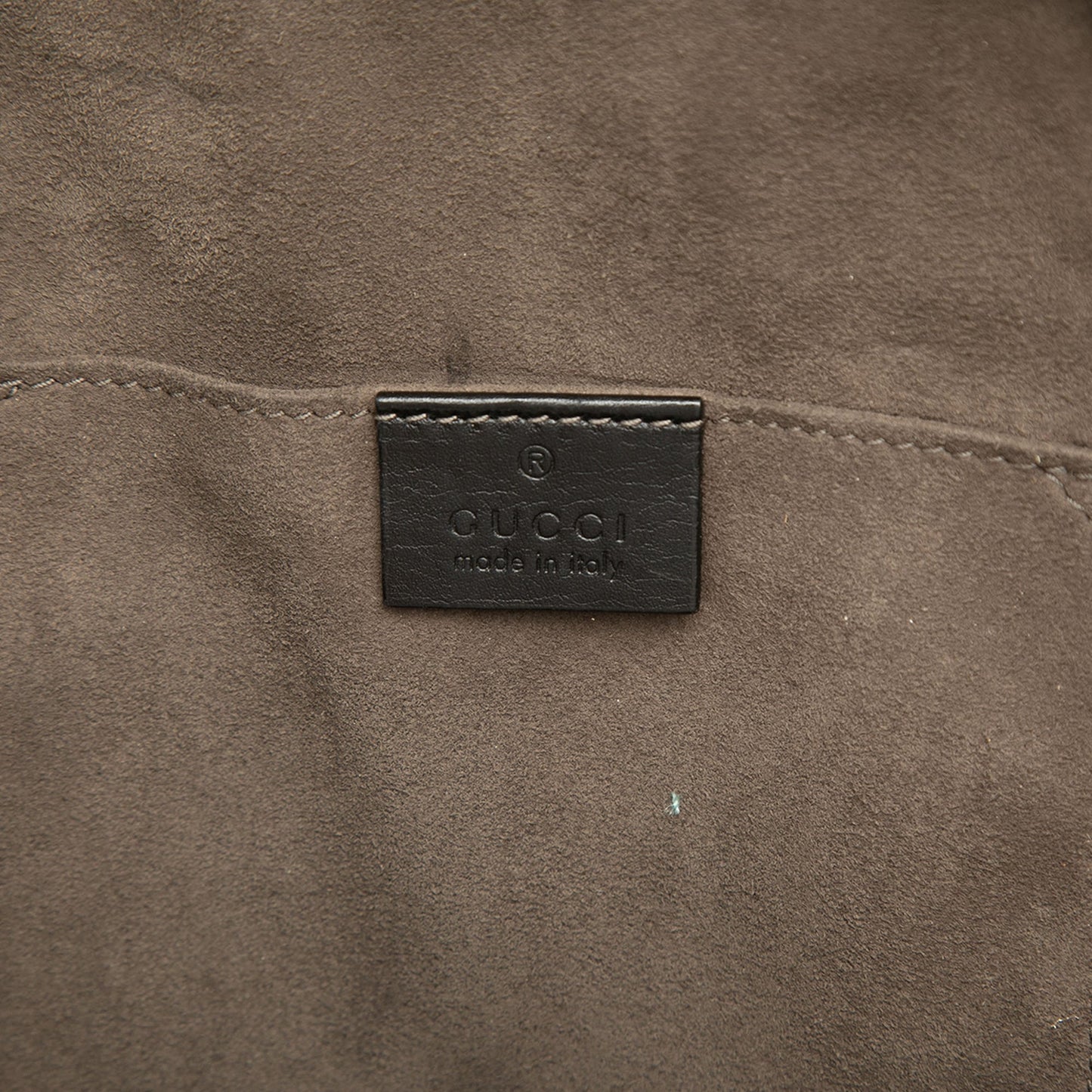 Gucci Guccissima Sling Backpack