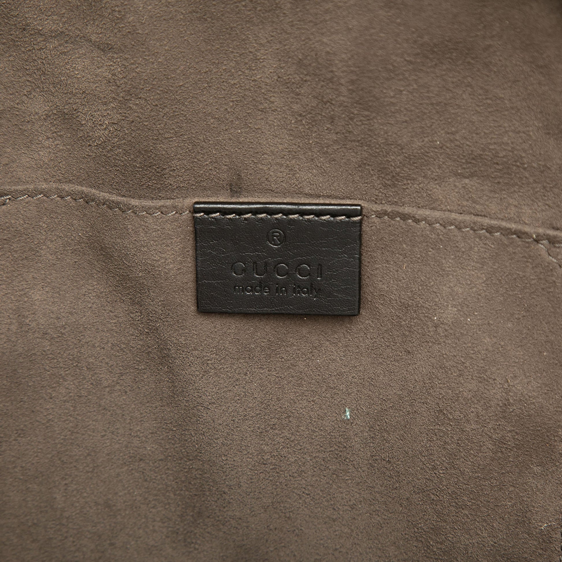 Gucci Guccissima Sling Backpack