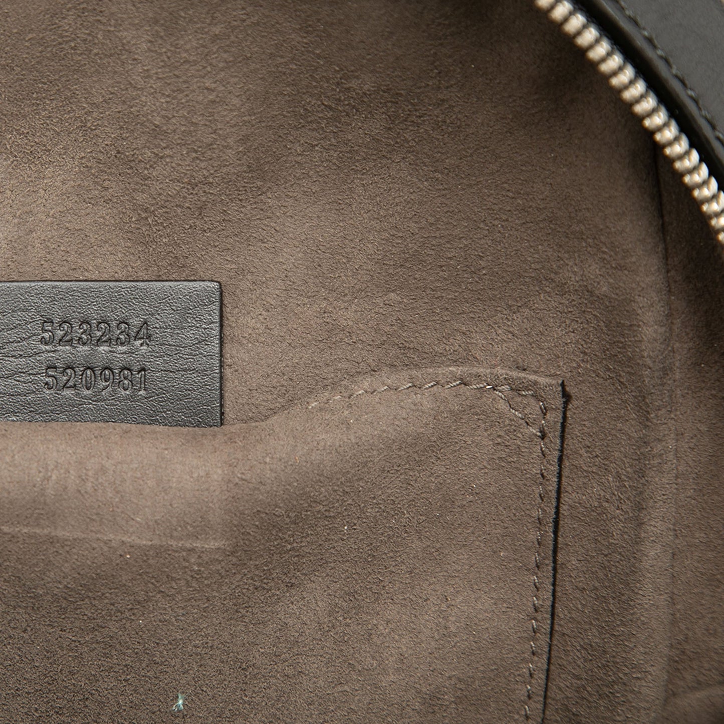 Gucci Guccissima Sling Backpack