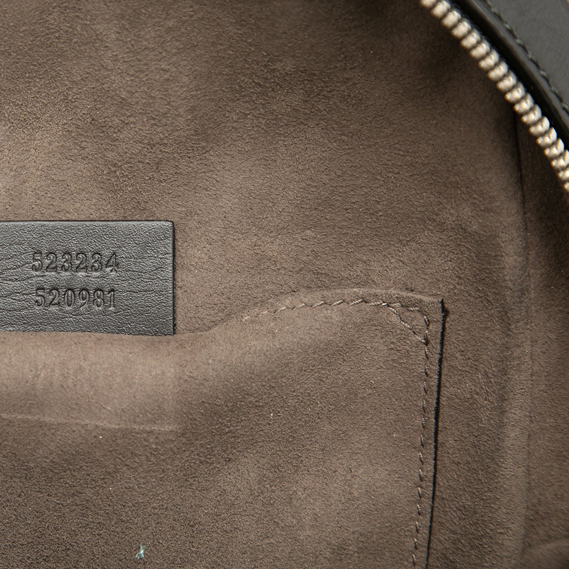 Gucci Guccissima Sling Backpack