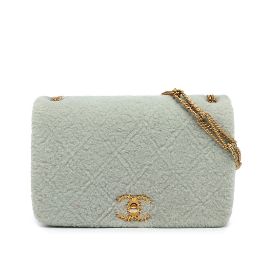 Chanel Quilted Shearling Chain Flap