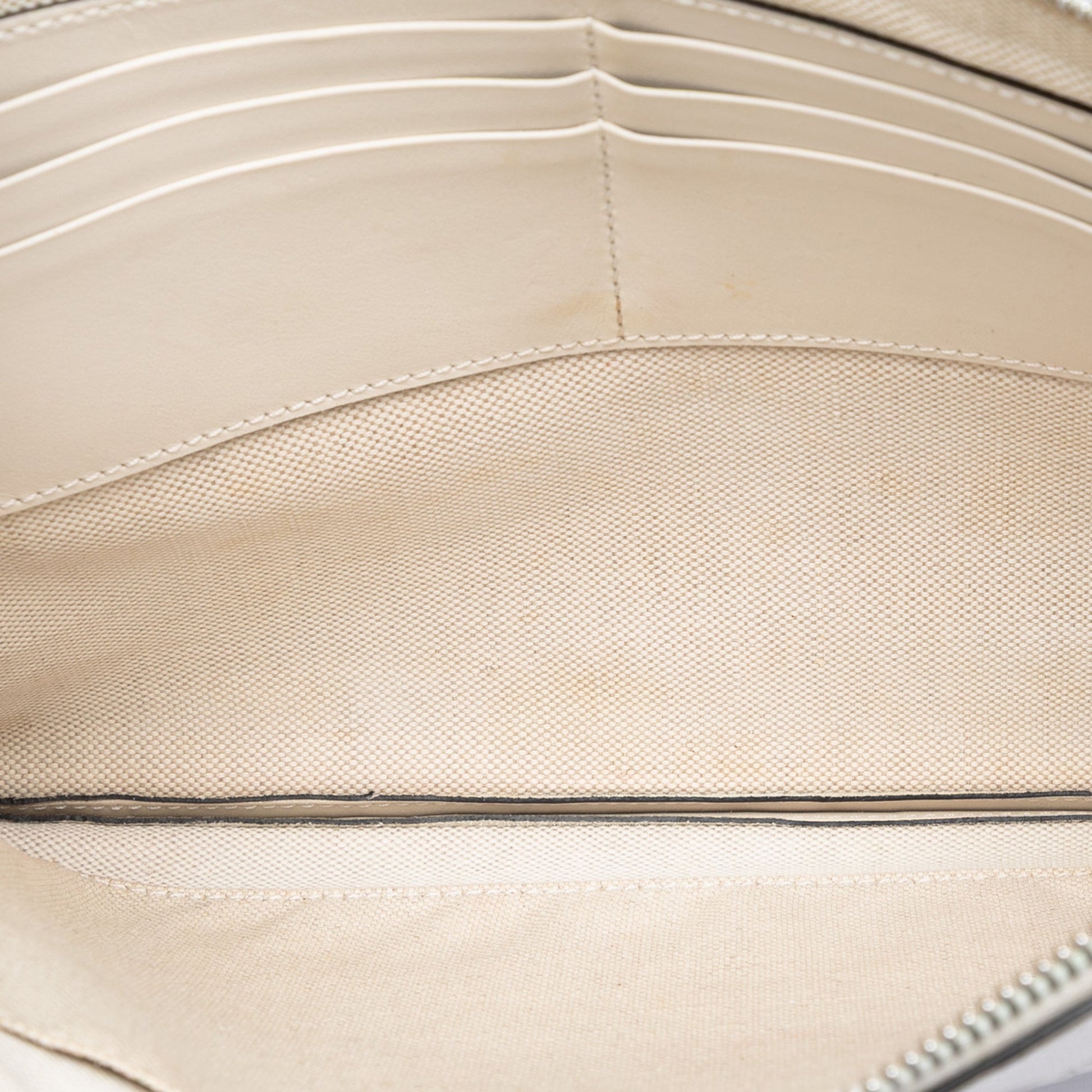 Gucci GG Embossed Perforated Calfskin Wristlet Clutch