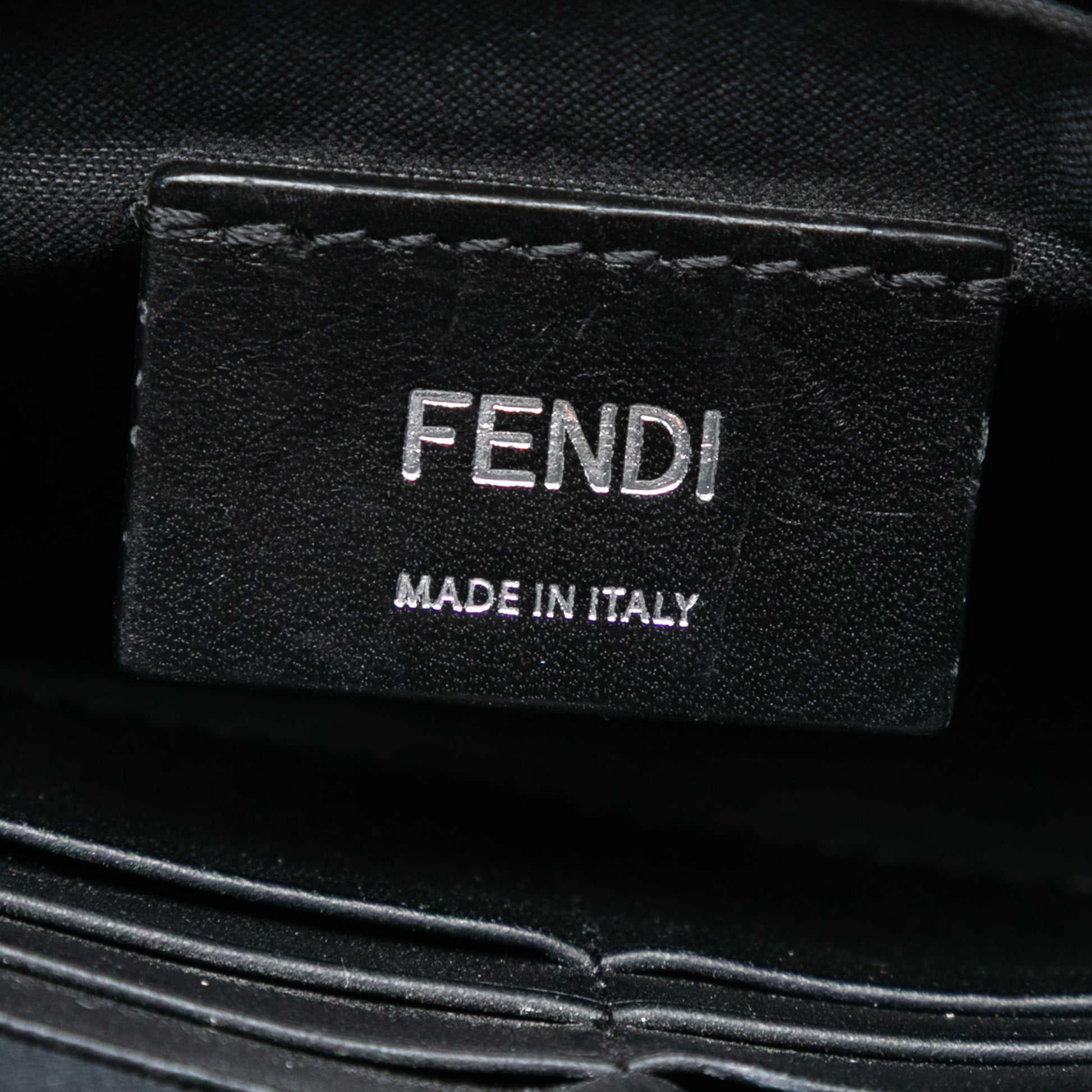 Fendi Studded Leather Trimmed Zucca Coated Canvas Clutch