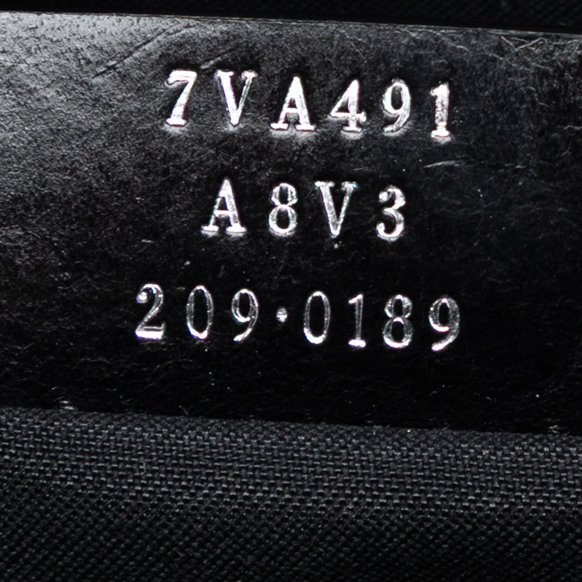 Fendi Studded Leather Trimmed Zucca Coated Canvas Clutch