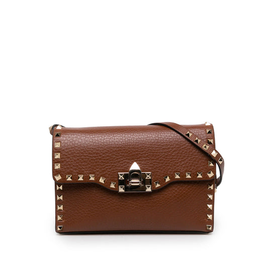 Valentino Medium Pebbled Calfskin Rockstud Flip Lock Crossbody — Brown