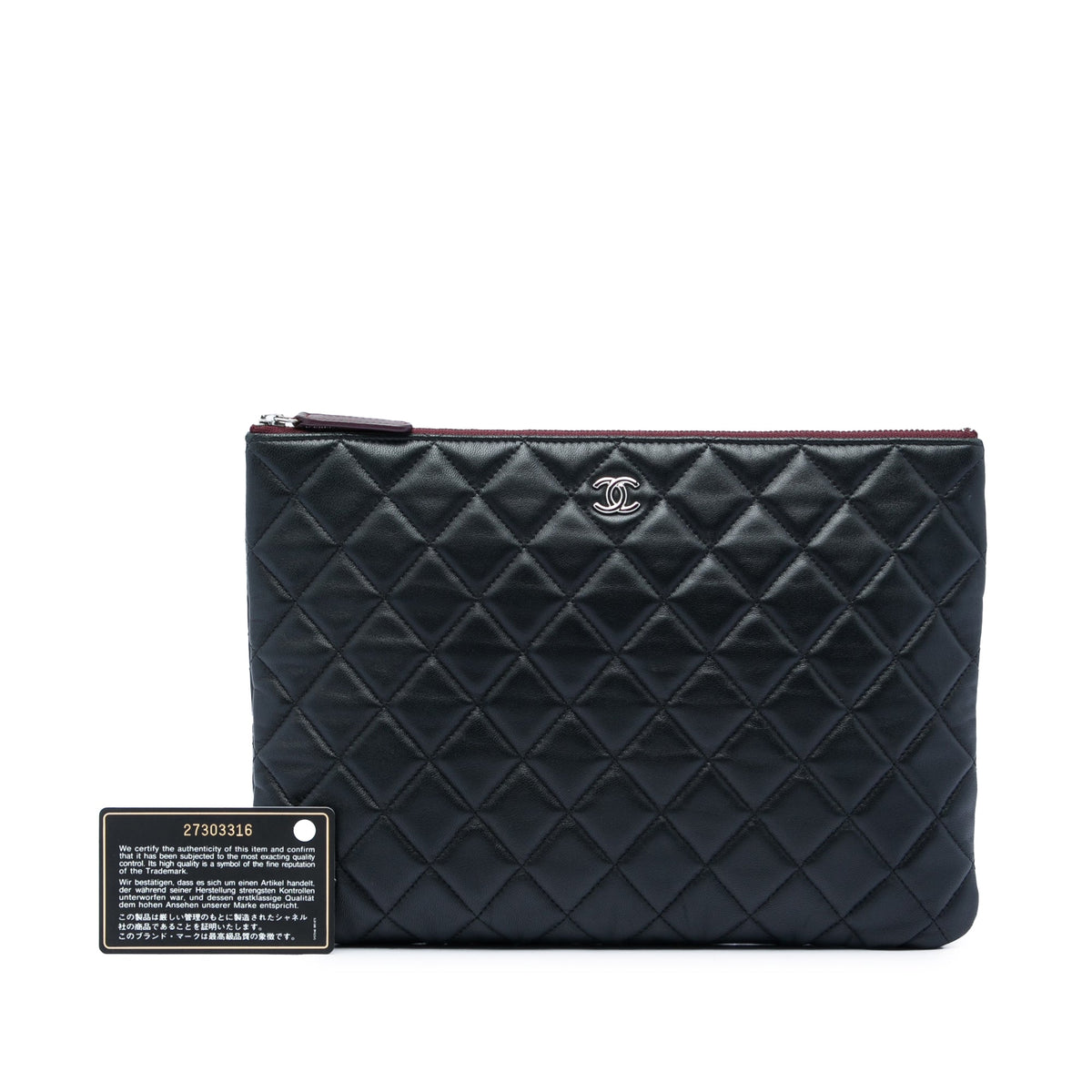 Chanel Medium Quilted Lambskin O Case Clutch