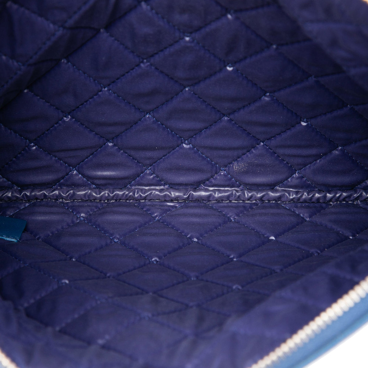 Chanel Medium Quilted Caviar Boy O Case Clutch — Blue