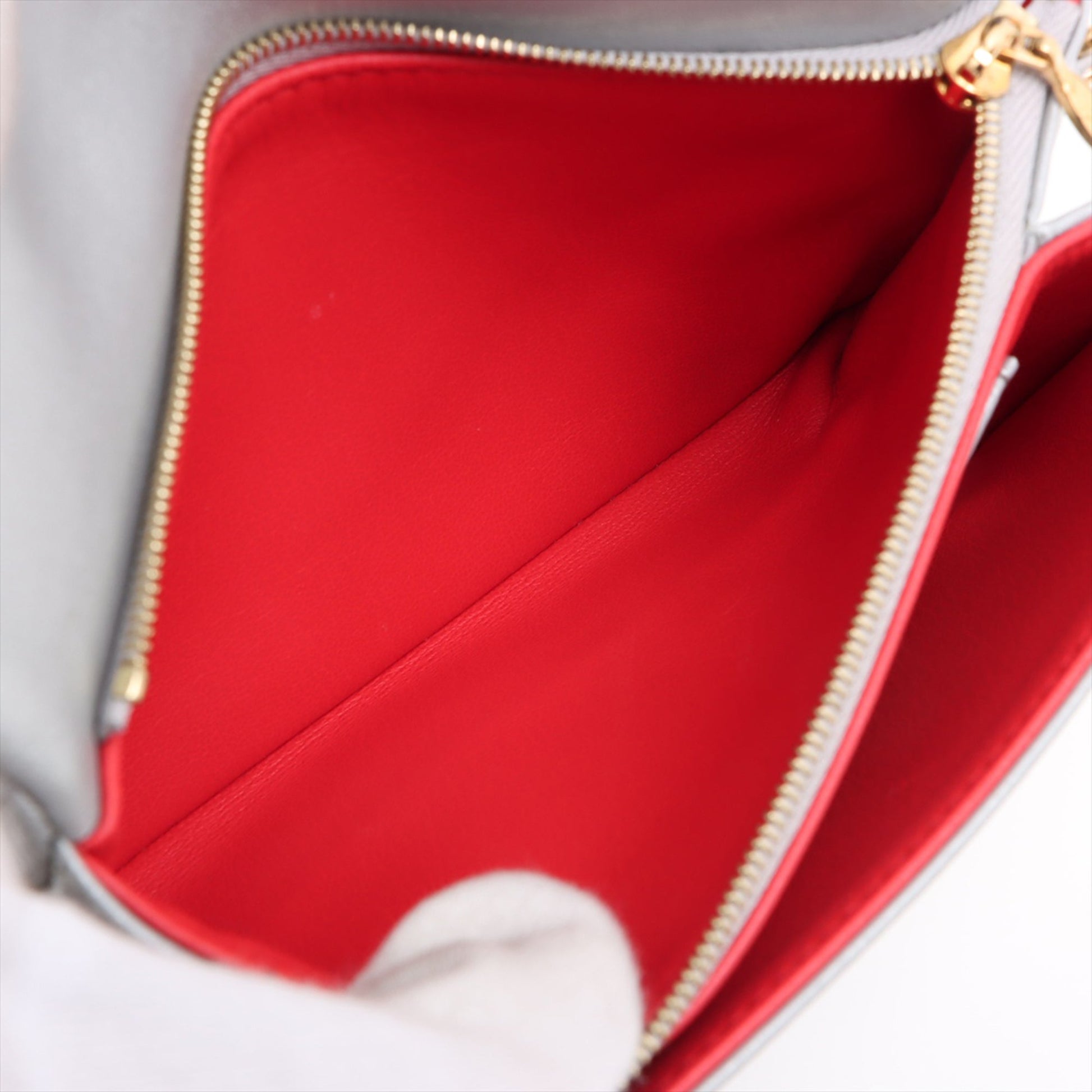 Louis Vuitton Monogram Embossed Lambskin Pochette Coussin