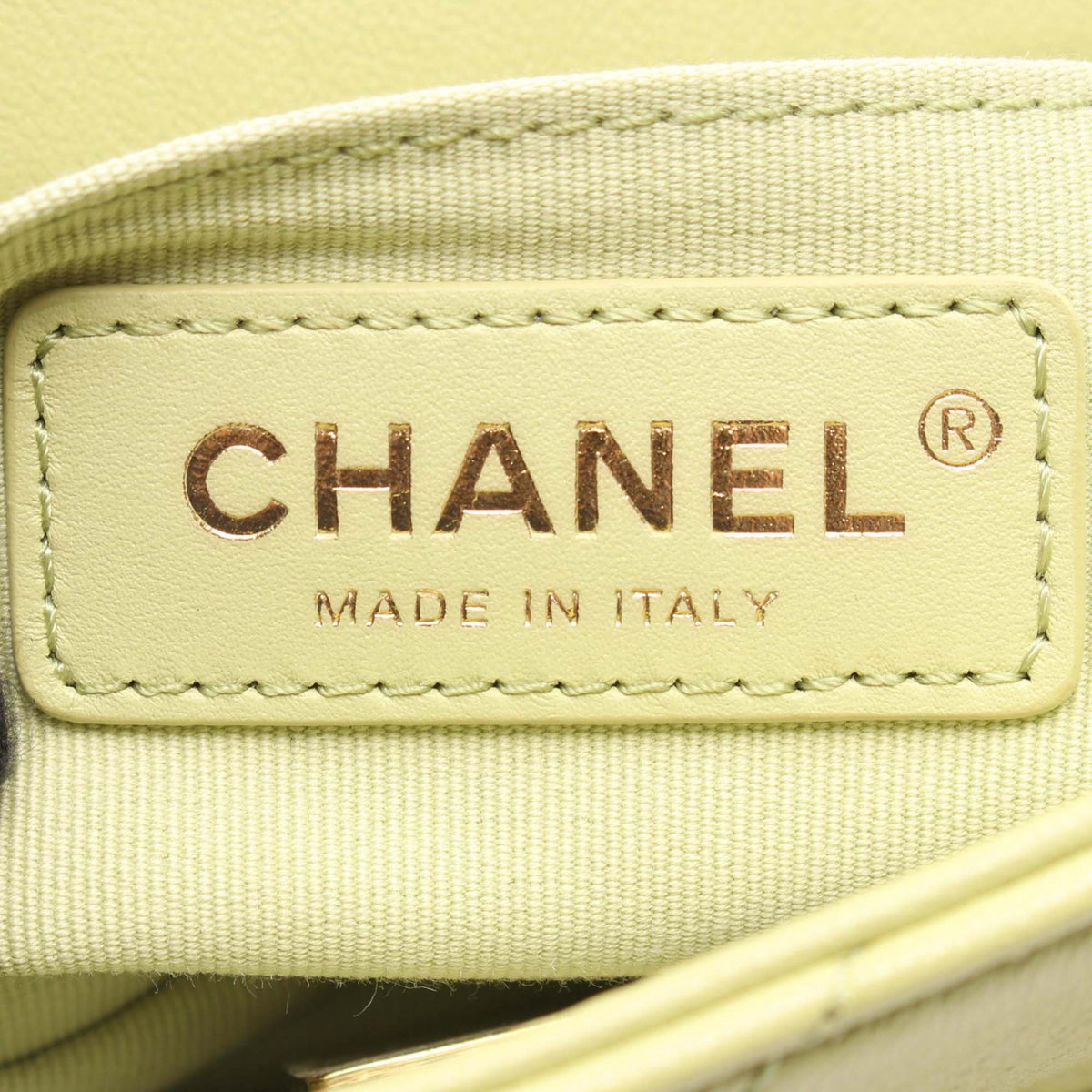 Chanel Mini Quilted Lambskin Oval Logo Chain Top Handle Flap